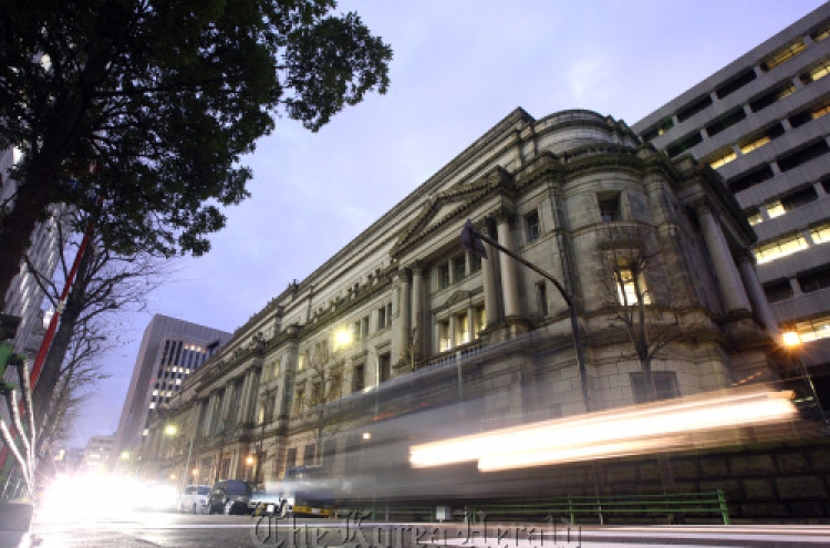 Bank of Japan raises growth forecast