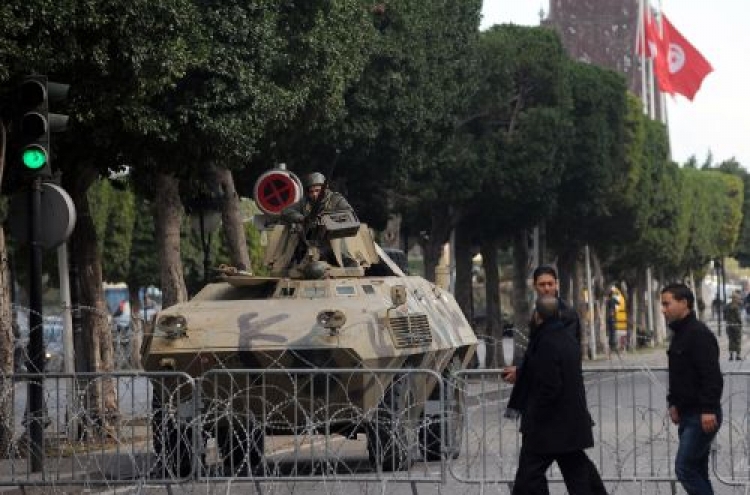 Tunisian police fire on crowd