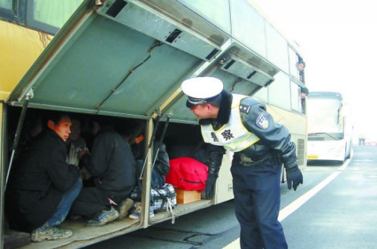 7 found hiding in bus luggage hold