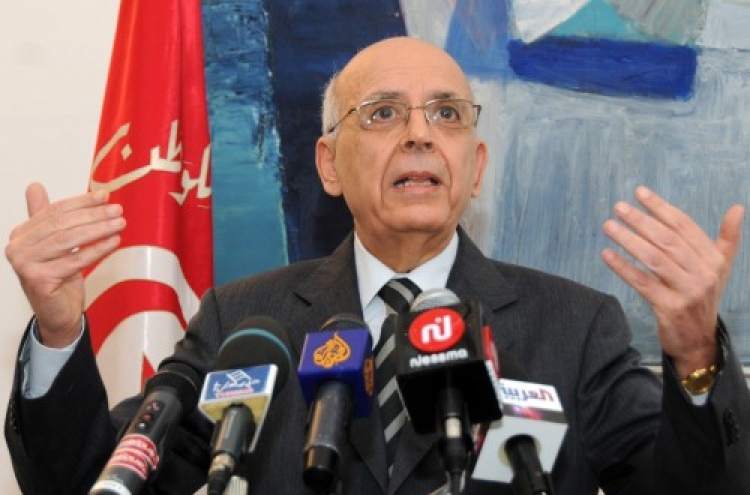 Tunisia gets new premier after new violence