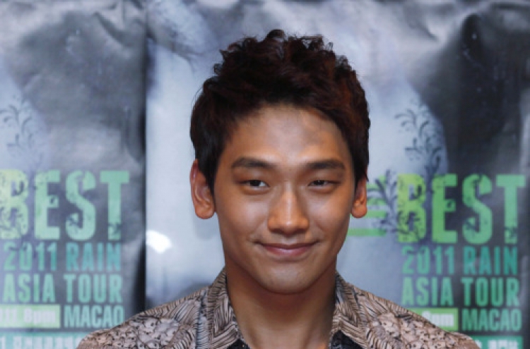 Rain talks music and movies, but not military duty