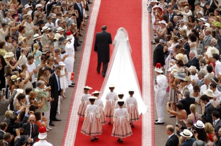 Monaco’s prince weds bride in lavish ceremony