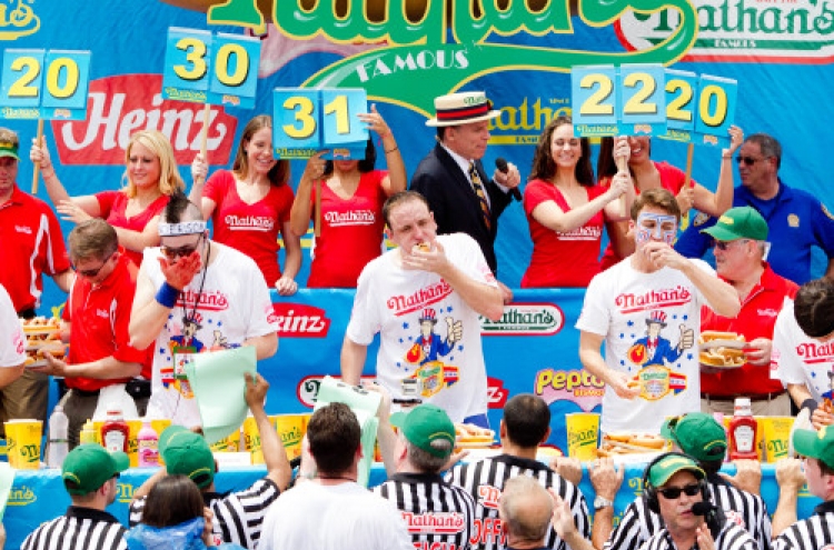 Man eats 62 hot dogs in 10 minutes