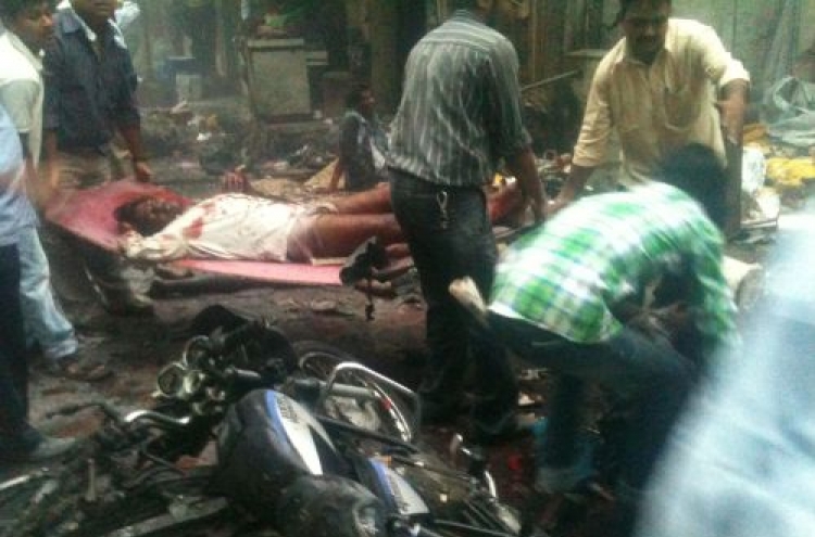 Serial bombings in Mumbai kill 17, wound 131