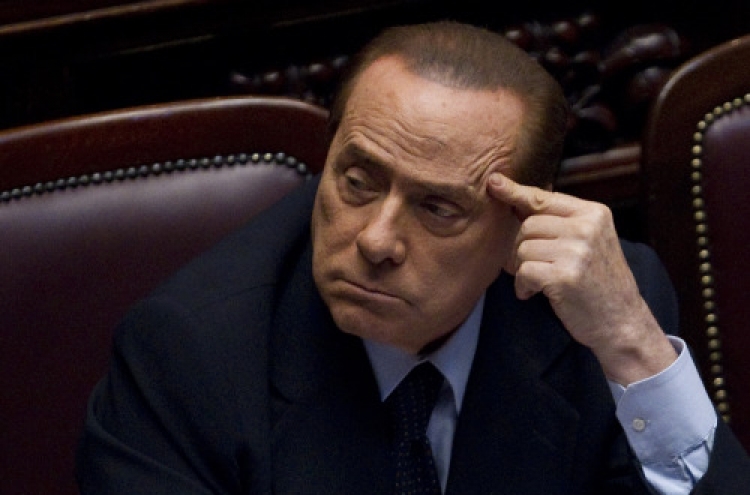 Berlusconi faces hearings on bribery, sex crime