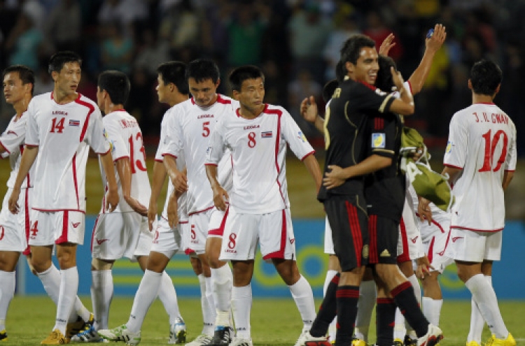 Mexico sinks North Korea 3-0