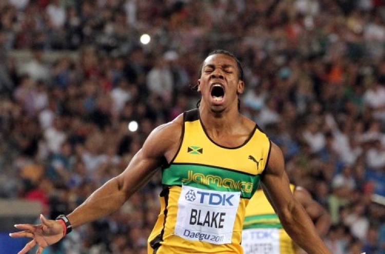 Blake wins world 100m title after Bolt disqualified