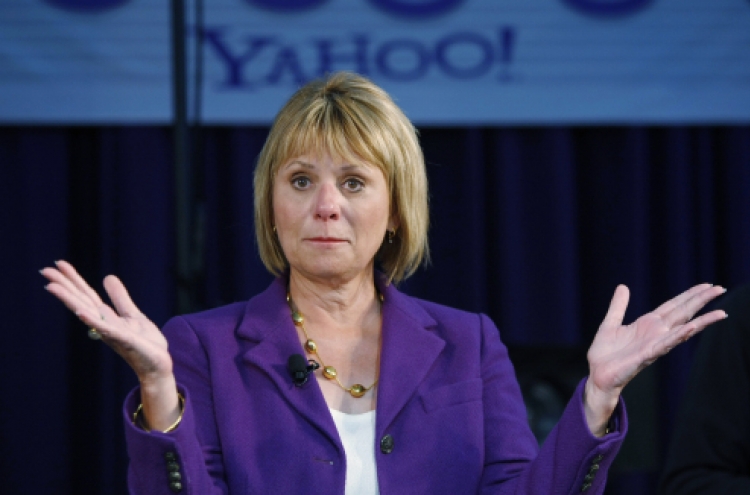 Yahoo fires Bartz as CEO, names CFO to fill void