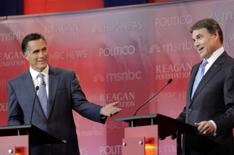 Perry, Romney clash in Republican debate
