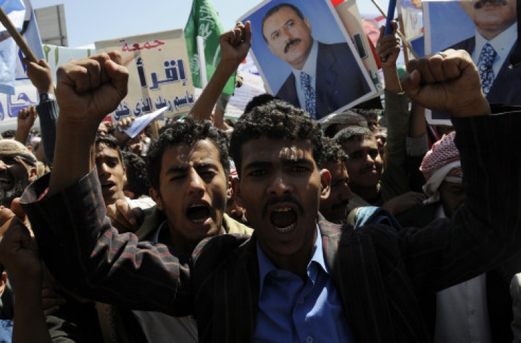 Gadhafi's death energizes Syrian, Yemeni protests