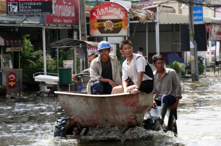 Thailand leader says floods may last 6 more weeks