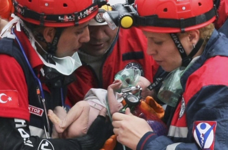 Teenager pulled out of Turkish quake rubble