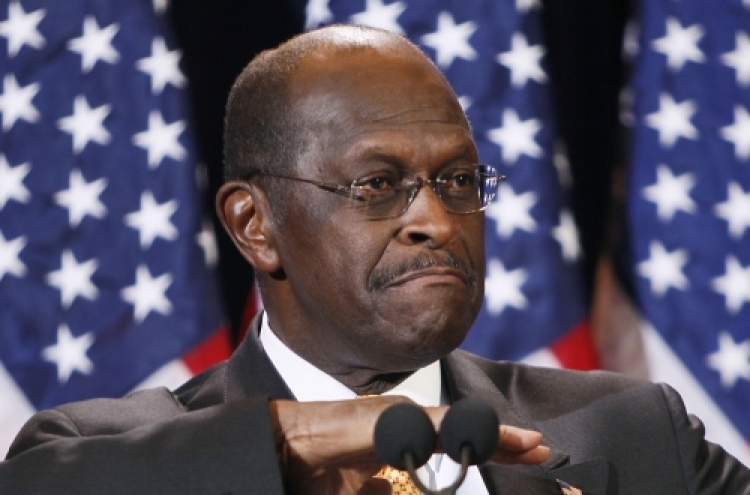 Defiant Cain says he won’t quit despite harassment allegations