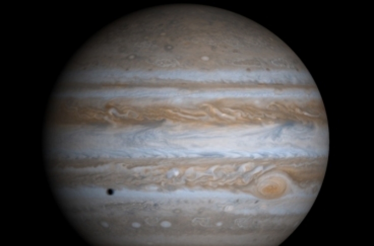 Massive lakes could lie beneath ice of Jupiter moon