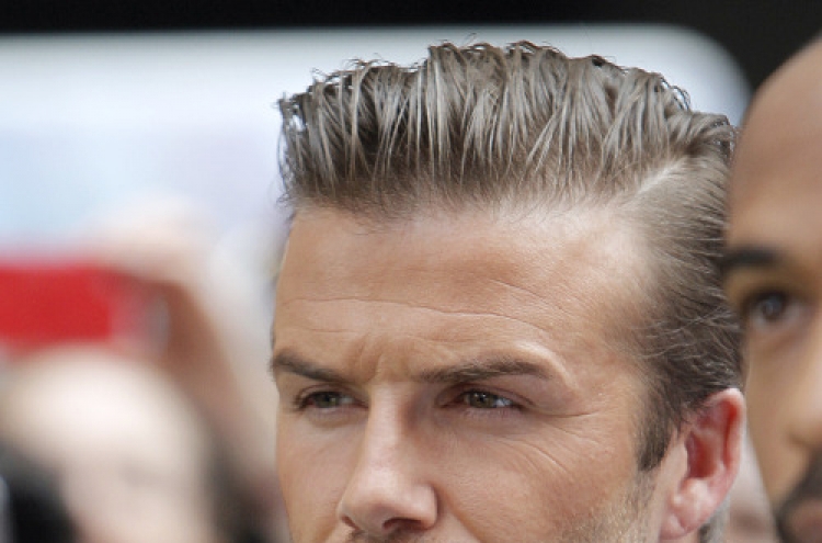 Beckham blasts Blatter over racism remarks