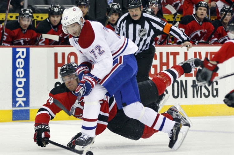 Devils downed as Kaberle shines in Canadiens debut