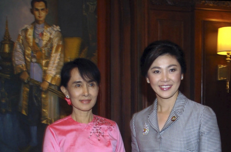 Thai P.M. first ASEAN leader to meet Suu Kyi