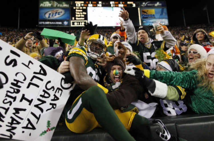 Rodgers, Packers lock up top seed