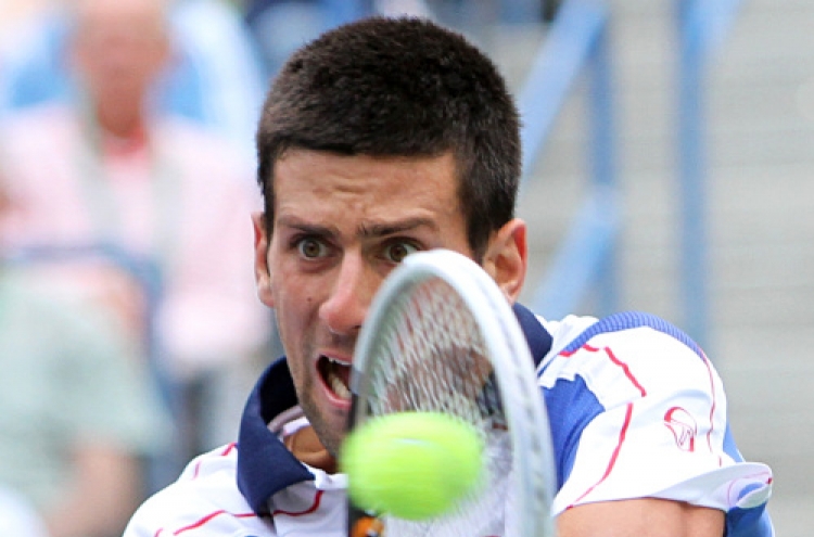 Djokovic steps up to dominate