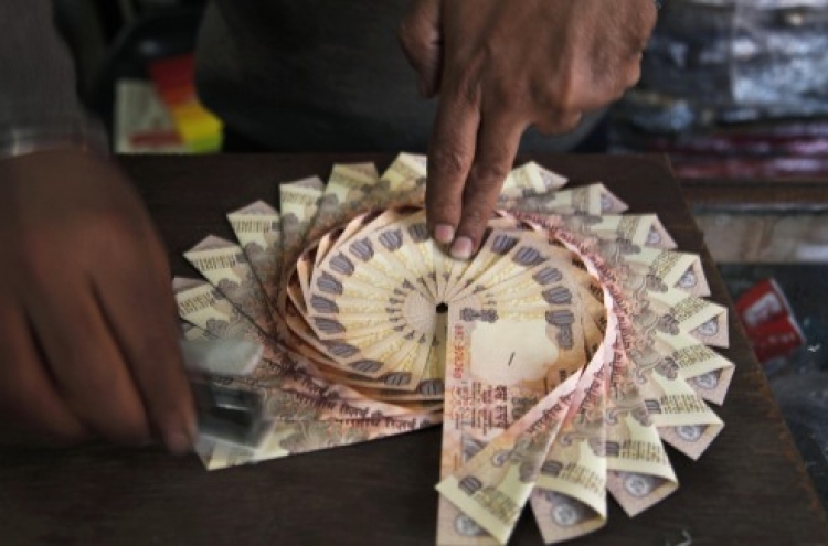 Japan, India seal $15b currency deal