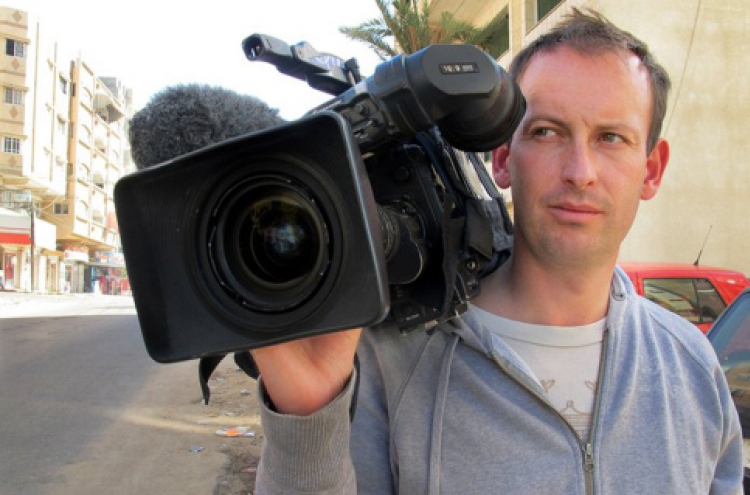 French journalist killed in Syria on official trip