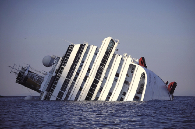 Ship aground off Italy; 3 bodies found