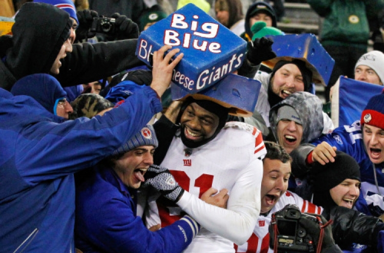 Eli, Giants stun Packers 37-20