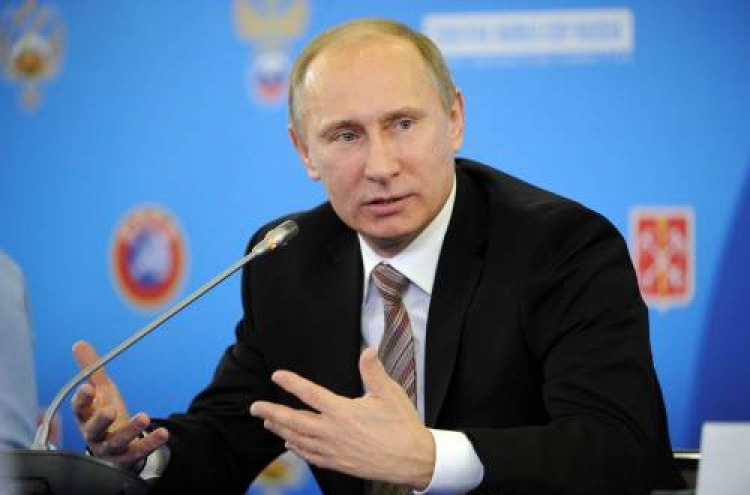 Putin berates wealthiest Russians for sports spending abroad