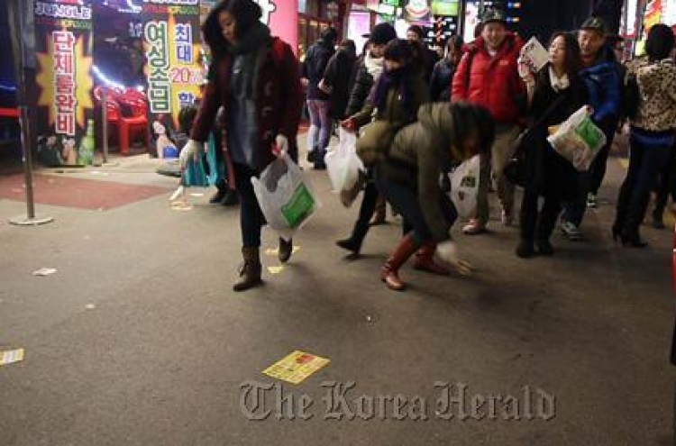 Expats join anti-prostitution flash mob