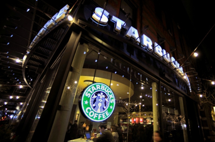 Starbucks to add wine at more cafes to lure evening diners