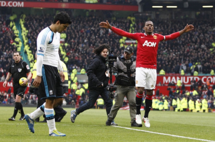 Suarez-Evra spat takes center stage