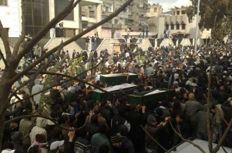 Syrian forces fire on funeral in Damascus