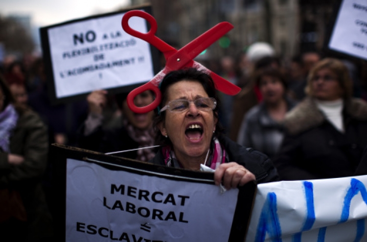 Thousands protest Spain’s new labor reforms