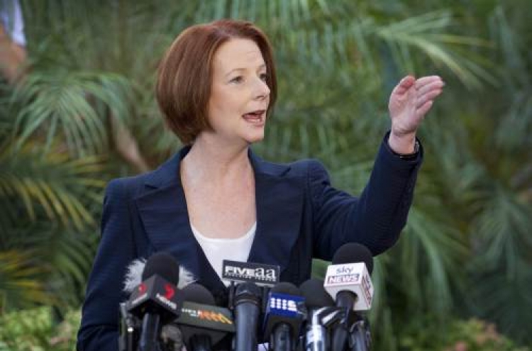 Australia’s Gillard calls a leadership vote