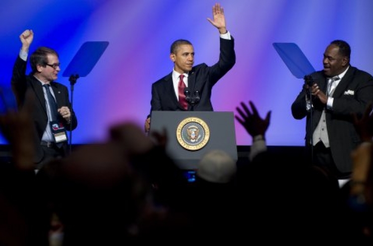 Punchy Obama hits Republicans over auto bailout