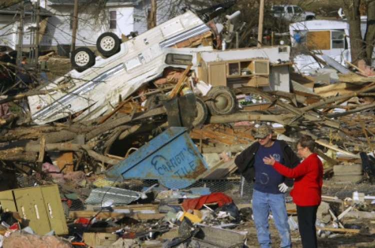 At least 12 dead as tornado strikes U.S.