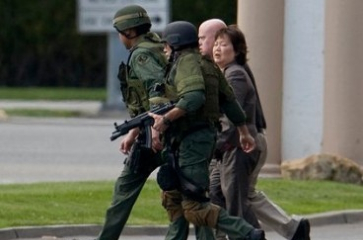 U.S. Police wound hostage-taker at Korean bank