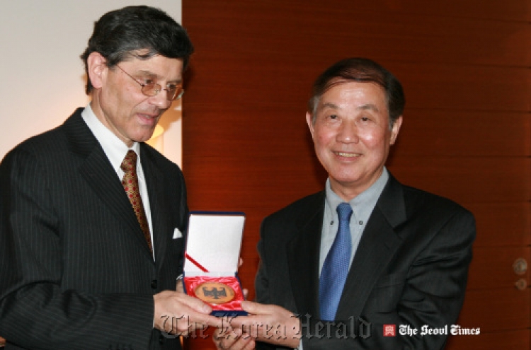 German Embassy recognizes press officer’s 40-year service