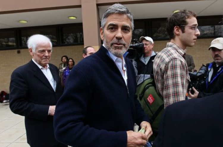 Clooney arrested in protest