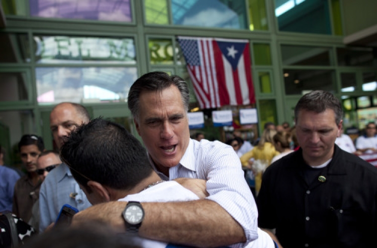 Romney looks to extend lead with Illinois win