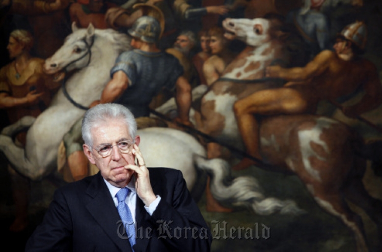 Italy’s Monti signals Spanish euro risk