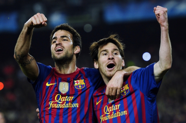 Messi, Barca power past Milan