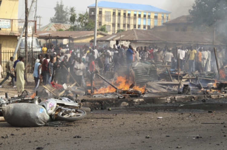 Car bomb near Nigeria churches kills 38