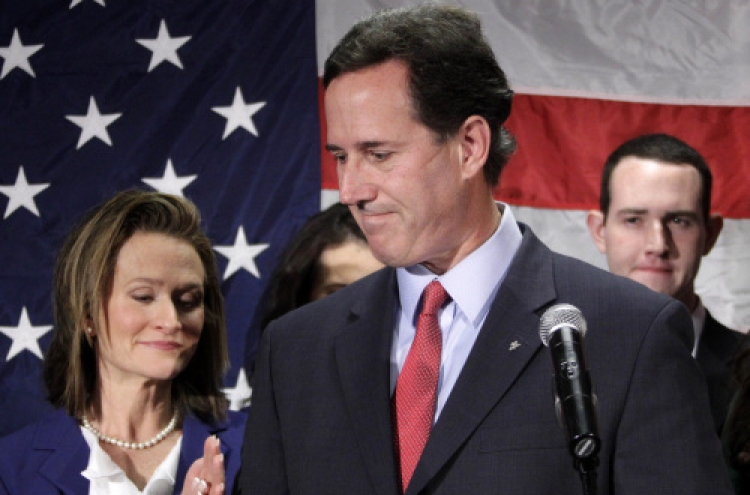 Santorum quits race, handing Romney Republican crown