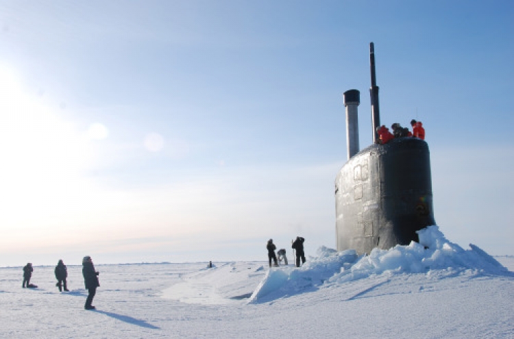 As ice cap melts, militaries vie for Arctic edge