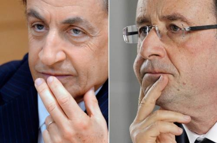 Hollande, Sarkozy heading to French vote runoff