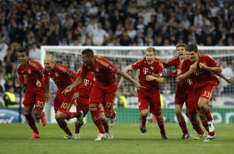 Bayern beats Madrid, to play Chelsea in final