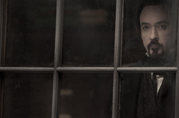 Cusack’s Poe makes ‘The Raven’ never dull
