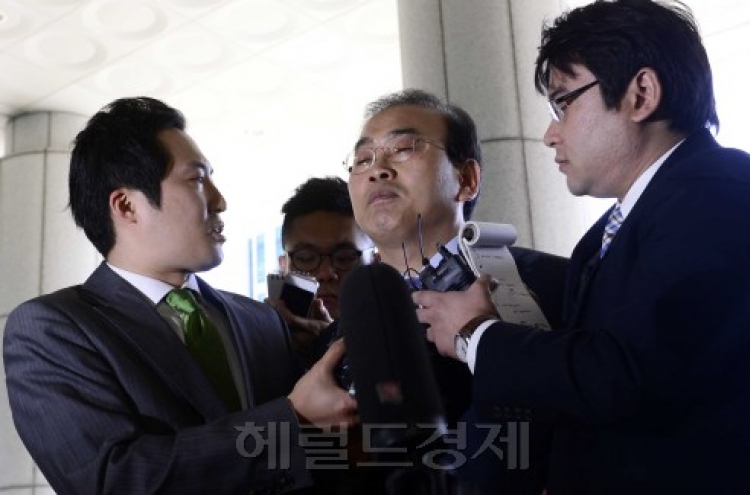 Former vice minister questioned in bribery scandal