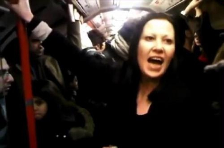 Woman admits to racist rant on subway